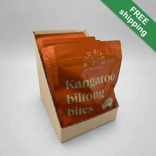 FREE shipping Box of 10 Wild Bites Kangaroo biltong bites on a gray background